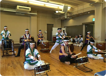 Photo from a research trip: Genryu Daiko from Brazil and Akasun Taiko Team from Argentina perform at the Kobe Migration Museum and Cultural Center.